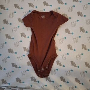 9 month, short sleeve maroon onesie by Carters